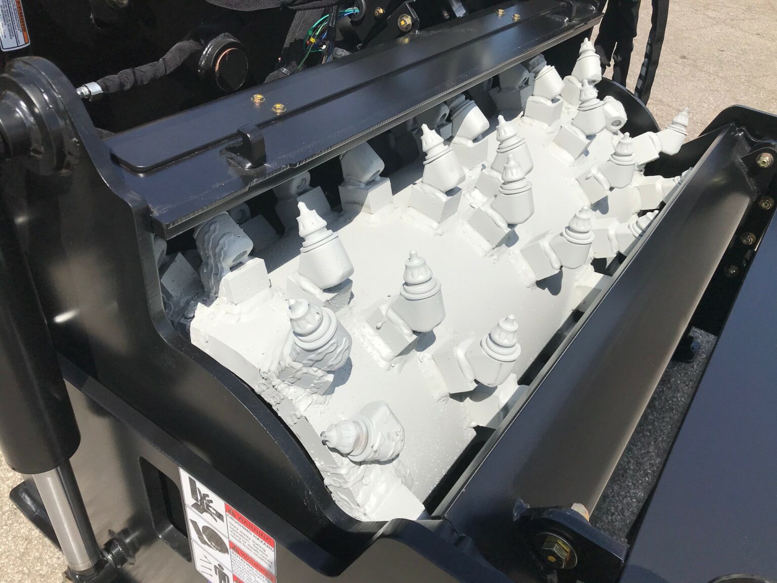 Cold Planers for Skidsteers and Compact Track Loaders RoadHog, Inc.